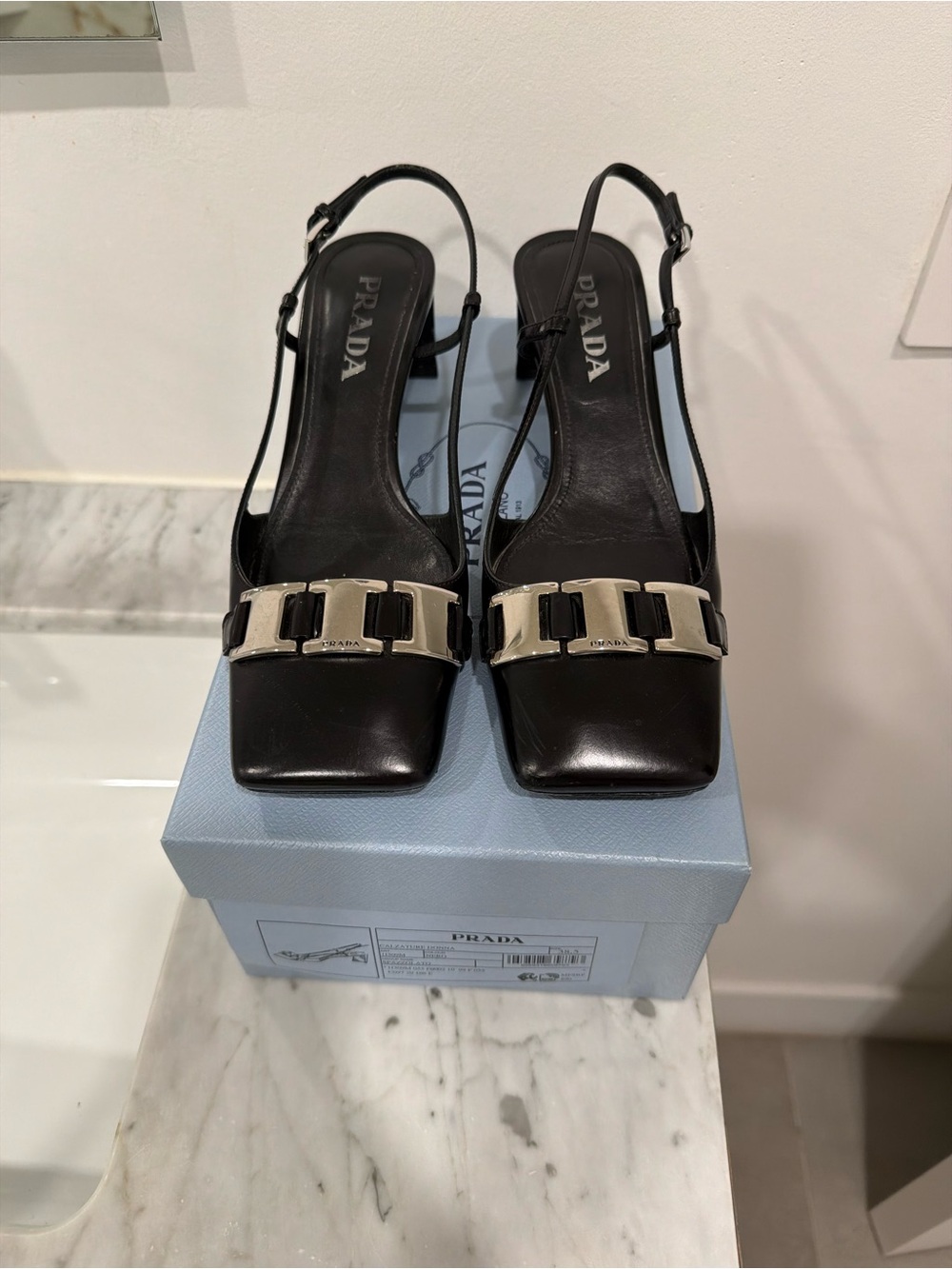 Prada Black Leather Slingback Heels with Silver Buckle Accent - Picture 1 of 3